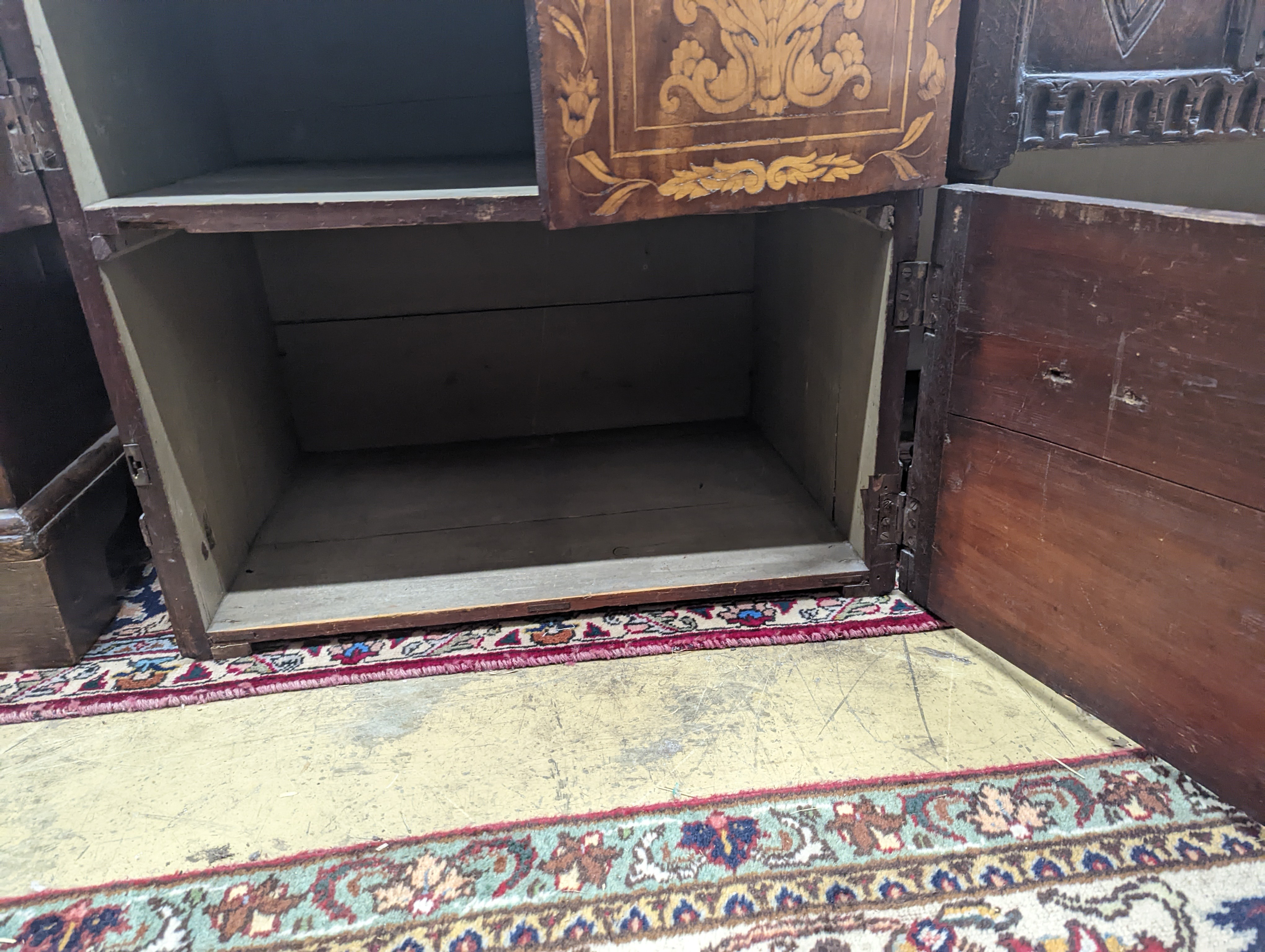 An 18th century Dutch floral marquetry walnut cabinet (altered), width 70cm, depth 48cm, height 87cm